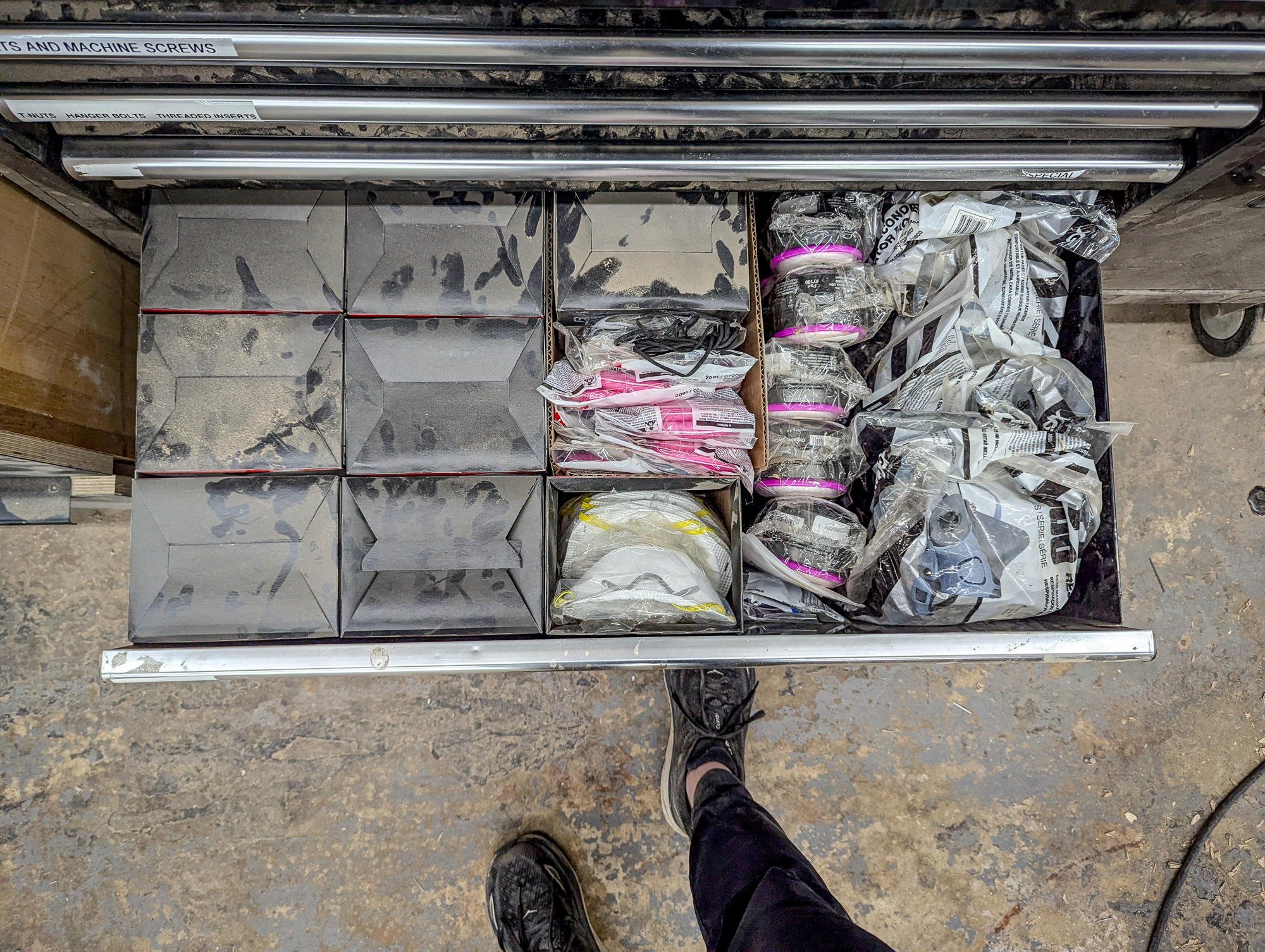 Organized tool chest with labeled bins — East Point workshop