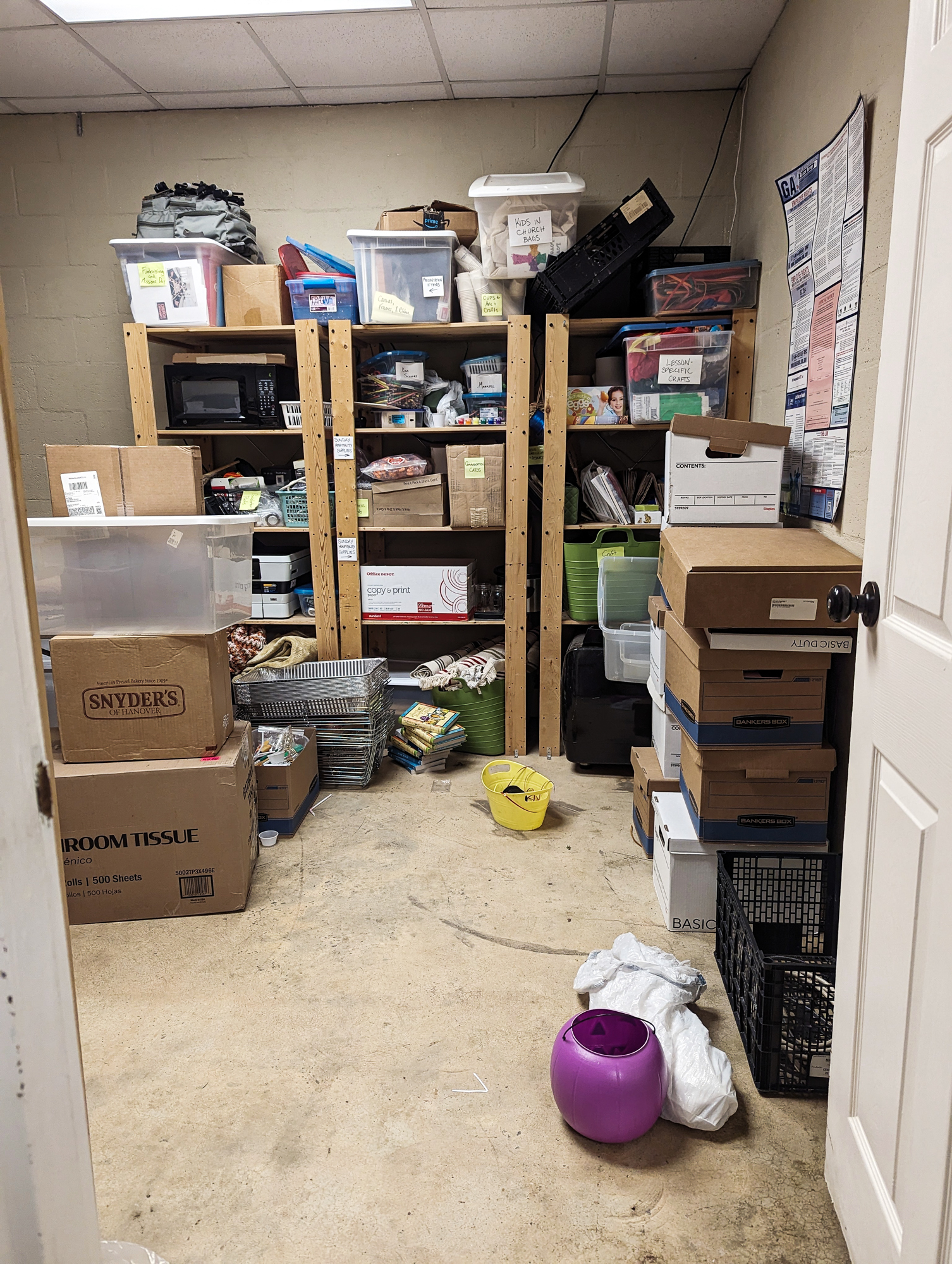 Cluttered church supply room in Kirkwood, Atlanta — before organizing